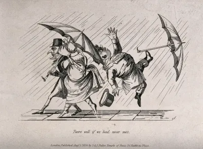 A man and his umbrella are knocked off the ground as a couple pass him with their umbrella