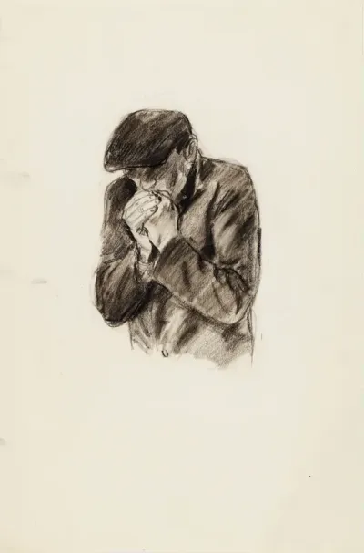 A Man Blowing into his hands