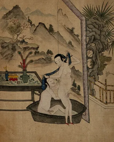 A man caresses his lover as she steps out of the bath