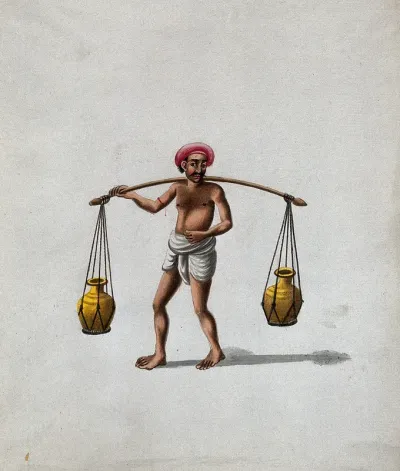 A man carrying a wooden pole (yoke) with pots suspended on either ends
