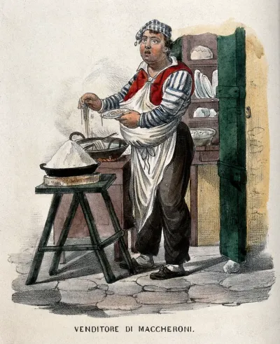 A man cooking macaroni for sale on the street