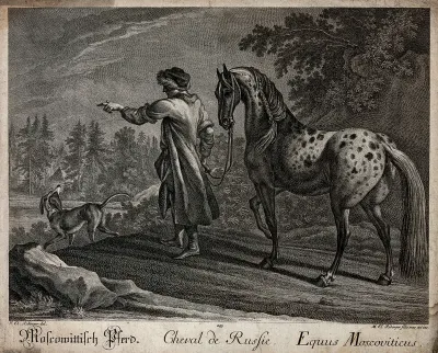 A man in a Russian attire is leading a spotted white horse at its reins out of the forest on to a clearing
