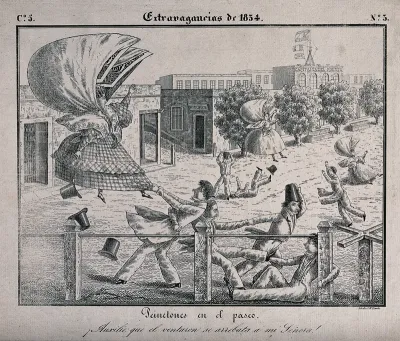 A man in Buenos Aires is holding on to the skirts of a woman as she is being blown away by the wind that has caught in her large head dress