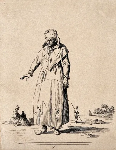 A man in ragged clothing