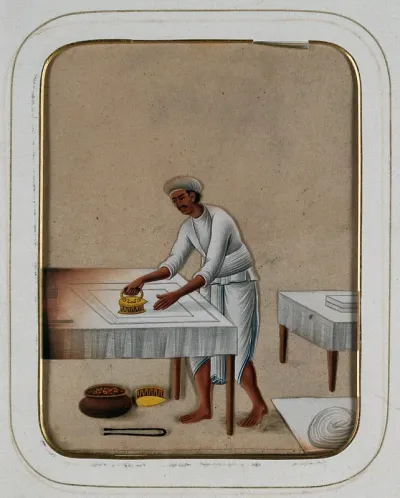 A man ironing clothes