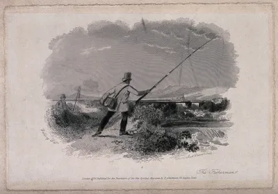 A man is fishing with a line from the banks of a river, as another man sits on the bank with a net in his hand