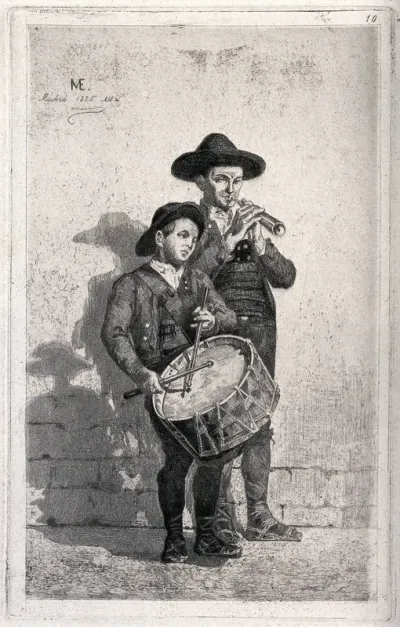A man is playing a type of flute and a boy is playing a drum