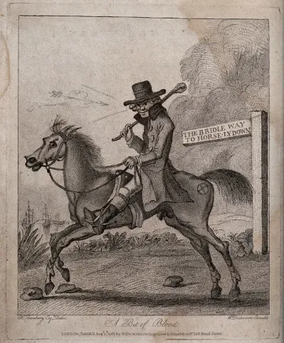 A man is riding a horse along a bridle way