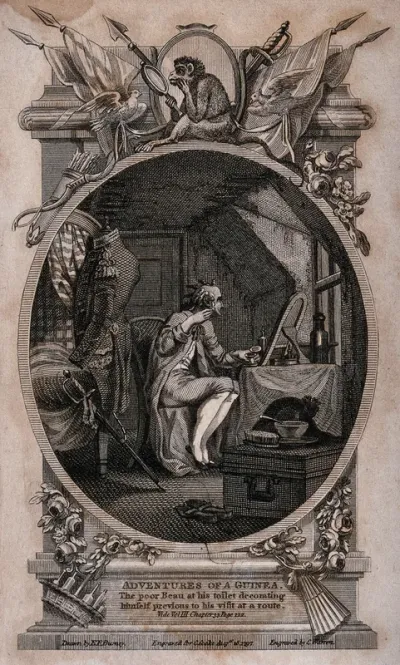 A man is sitting in front of a mirror combing his hair