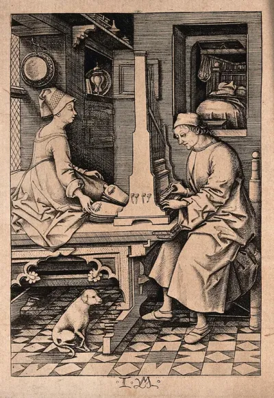 A man plays the organ as his wife uses the bellows to provide the necessary air