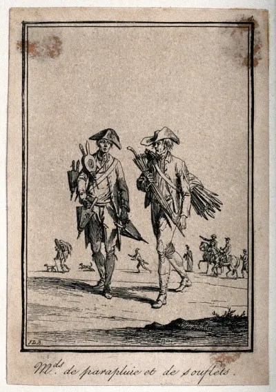 A man selling bellows and another selling umbrellas