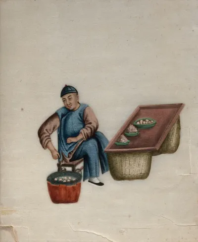 A man selling steamed dumplings (?)
