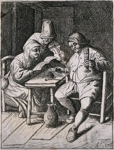 A man sits drinking at a table and is entertained by a fiddler as a woman holds his music open