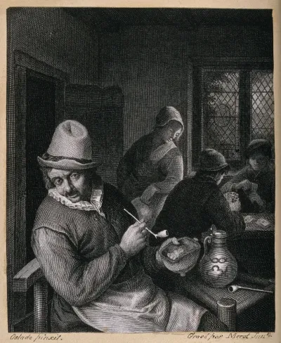A man sitting indoors with tobacco pipe, jar and beer jug, behind a woman watches two card players
