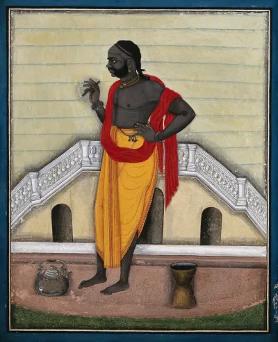 A man smoking an Indian type cigar