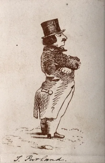 A man wearing a coat and top hat is standing with his arms folded