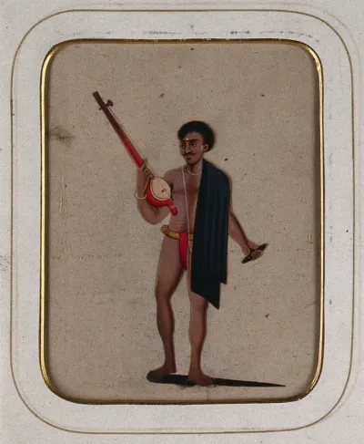 A man wearing a loin cloth and a black shawl holding musical instruments in both hands
