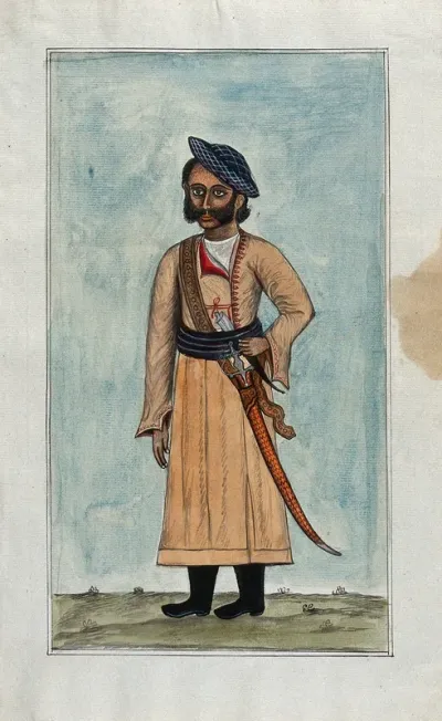 A man wearing a Mughal dress with boots and an English cap