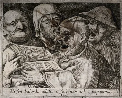 A man wearing spectacles is singing from the songbook he is holding as three others join in and a fourth man keeps his mouth shut