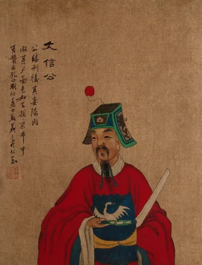 A man with a green hat