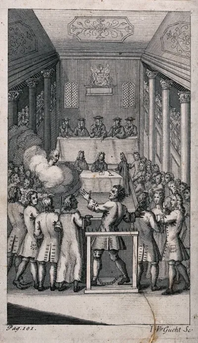 A manacled man standing before a jury in a courtroom making gestures of protest while being confined in a spiked frame