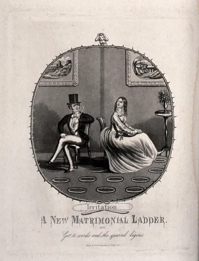 A married couple, Charles and Julia, quarrel and sit with their backs to one another