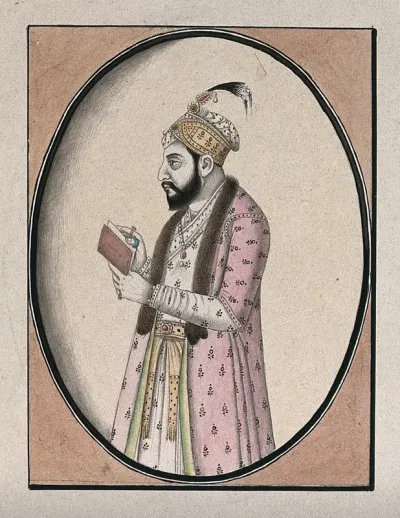 A member of the Mughal royal family, holding a book (?)