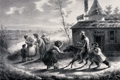 A miller sits on a donkey which is being pulled by the reins and pushed from behind to make it move