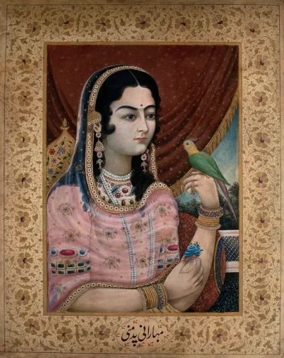 A Mughal courtesan or member of a Mughal royal family looking at a parrot perched on her hand