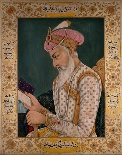 A Mughal emperor or member of a royal family reading a book