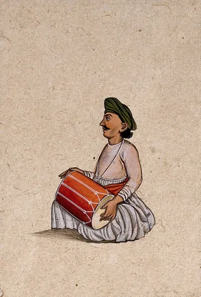 A musician from Lucknow playing the dholak (double-sided drum)
