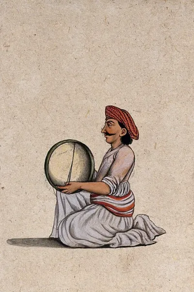 A musician from Lucknow playing the tambourine