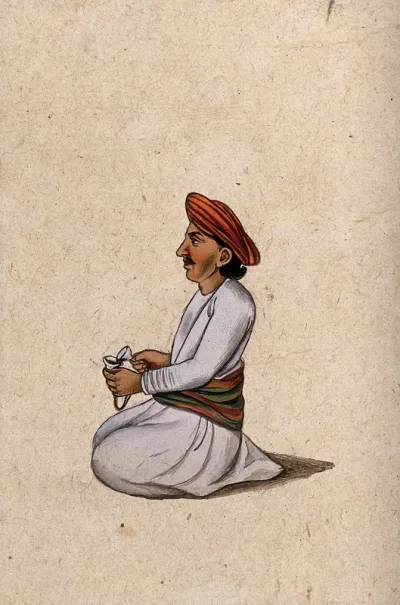 A musician holding a shankh (conch shell)