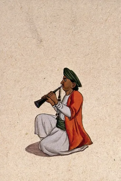 A musician playing the shehnai (a North Indian oboe)