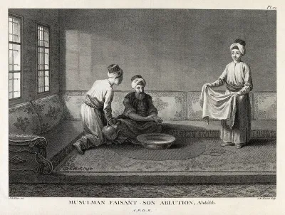 A Muslim man at his ablutions being attended by two servants