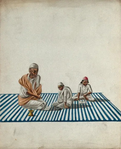 A Muslim teacher giving lessons to two children