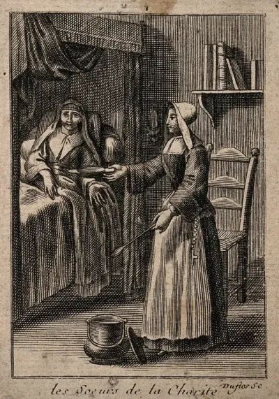 A nun (Sister of Charity) feeding a sick patient