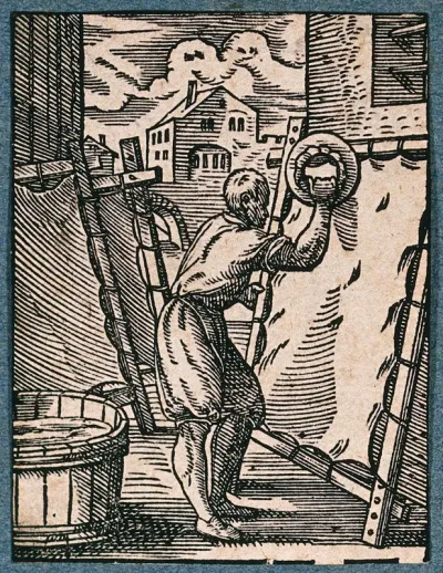 A parchment-maker smoothing an animal hide on a stretcher