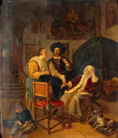 A physician taking the pulse