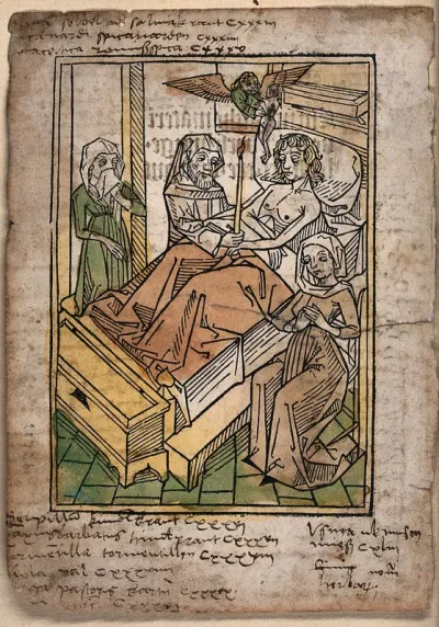 A priest gives a dying man his last rites