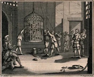 A prisoner is shown a cage which is suspended from the ceiling and already contains another prisoner