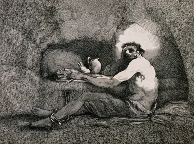 A prisoner is sitting on straw in a cave with his feet chained to the wall, there are a few provisions on a small shelf in the rock