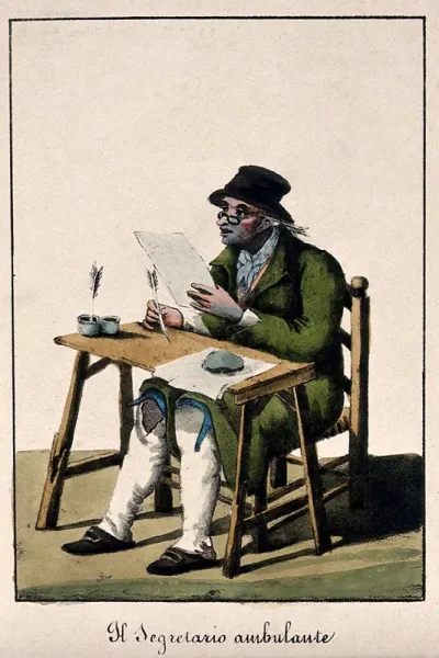 A public letter-writer sits at a desk reading from the paper he has written on with his quill pen