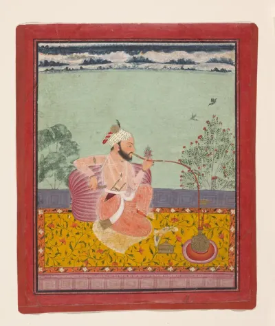 A Raja Smoking a Hookah