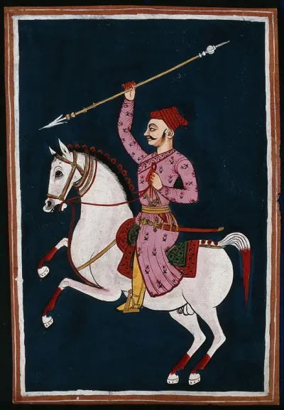 A Rajput warrior on a horse holding a spear