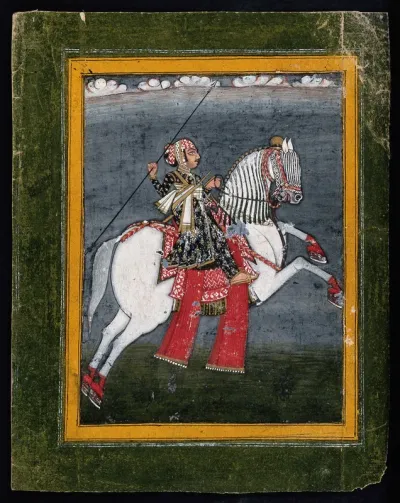 A Rajput warrior riding a horse