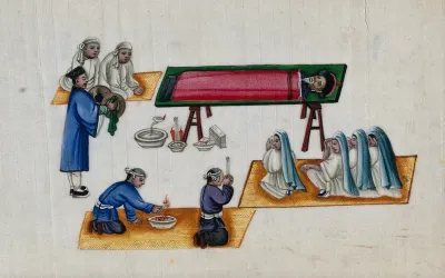 A recumbent Chinese man surrounded by women in prayer and other attendants burning incense etc