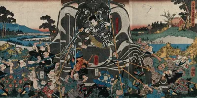 A samurai standing on the lap of a great, outdoor stone statue of the King of Hell, fighting off a mob of assailants