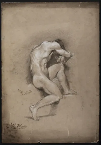 A seated male nude with his head bent forward onto his folded arms