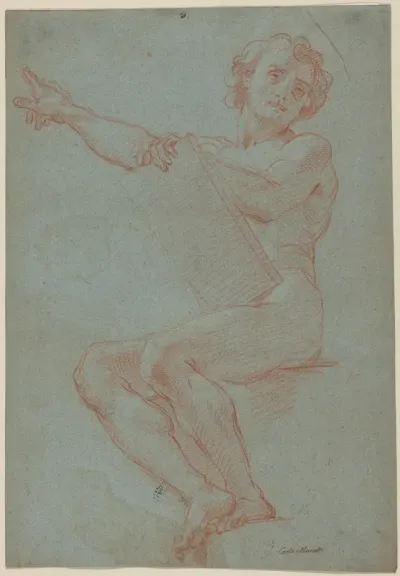 A Seated Man Holding a Tablet